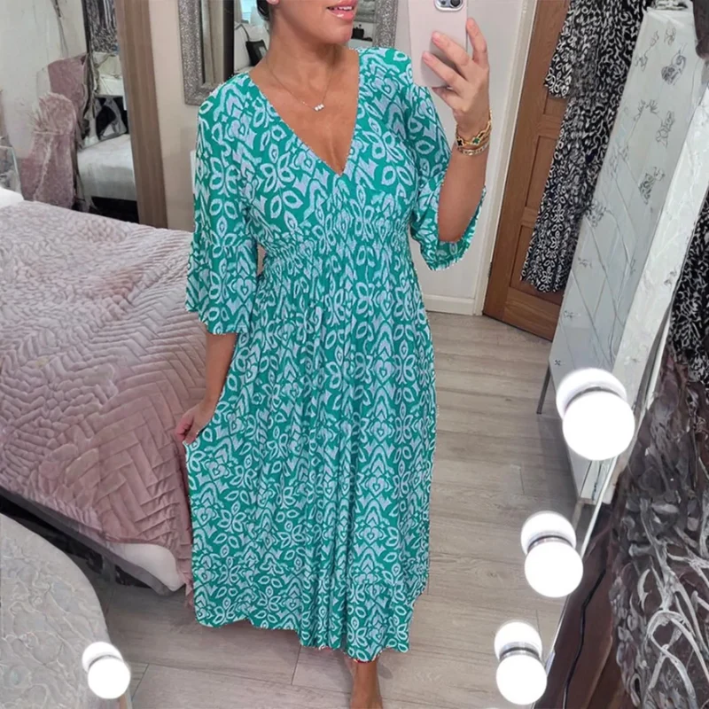 Icone™ SummerDress - Elegant Flödande Tryckt V-Hals Maxi Sommarklänning