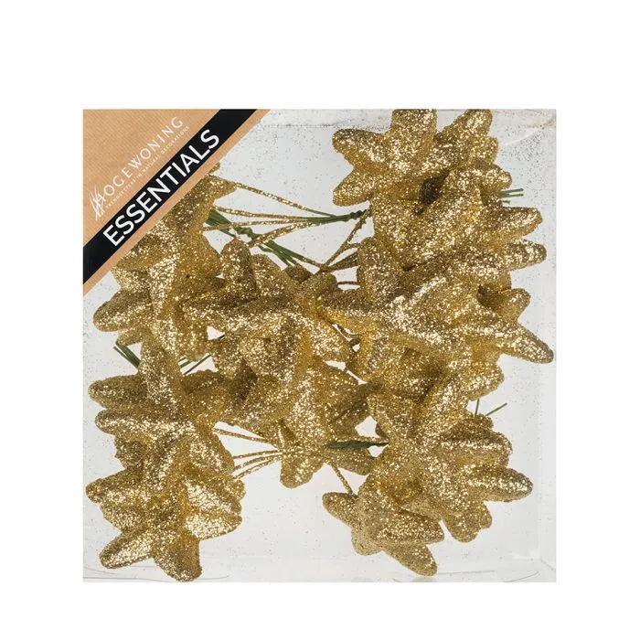 Guldfärgade glitterstjärnor på tråd