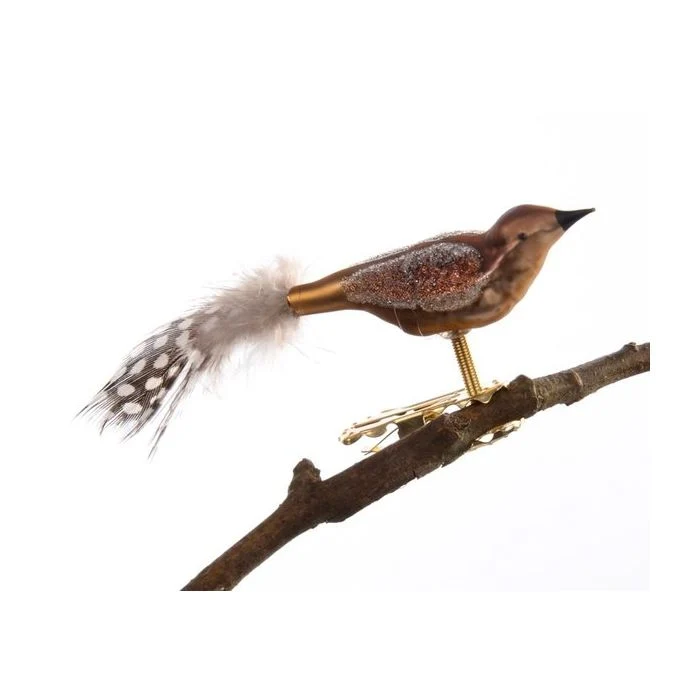 Fågel med klämma och pärlhönsfjädrar